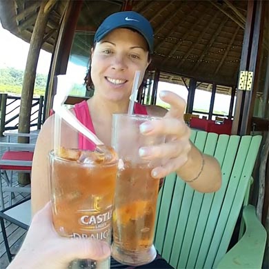 Having a refreshing drink at Umngazi River Bungalows